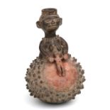 African Art / Tribal Art: An African clay pot depicting a female figure and baby in womb. 25cm high: