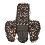 African Art / Tribal Art: An African mask surrounded by three panels comprising beadwork and