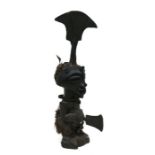 African Art / Tribal Art: Songye medicine figure with metal protrusions and axe on head, blade