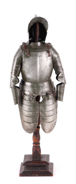 A miniature suite of 16th Century style German armour mounted on a stand, 56cm high