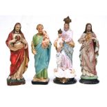 A Madonna and Child painted cast plaster group, 42cms high; together with other religious groups,