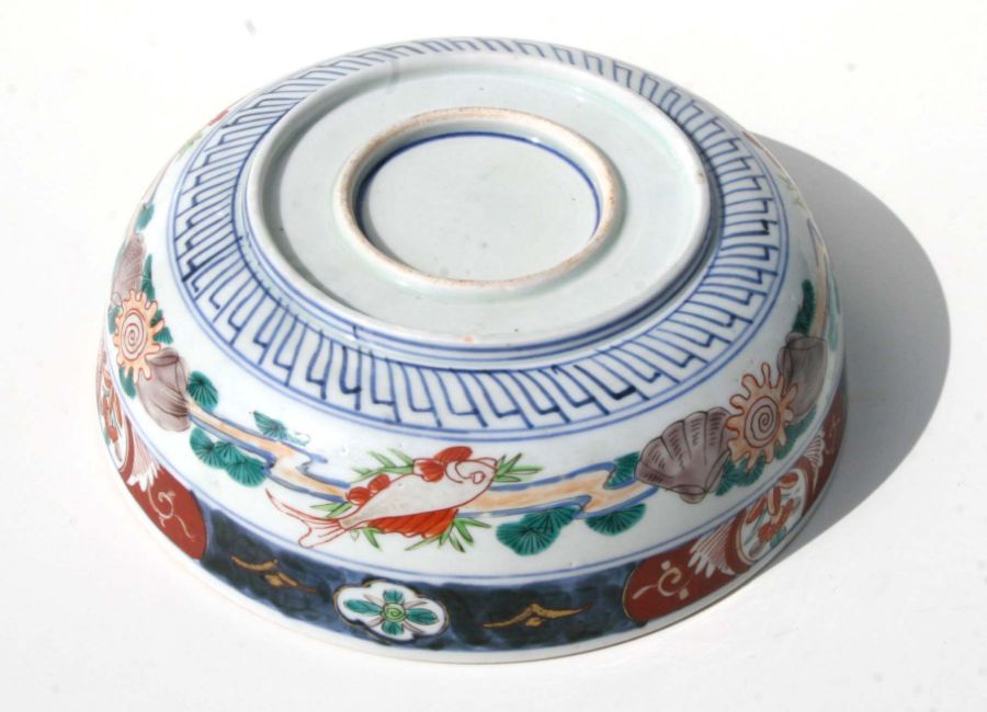 A Japanese Imari bowl decorated with birds in a river landscape, 25cms diameter together with a pair - Bild 3 aus 16