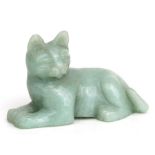 A Chinese carved jade / hardstone figure in the form of a recumbent cat, 8cms wide.