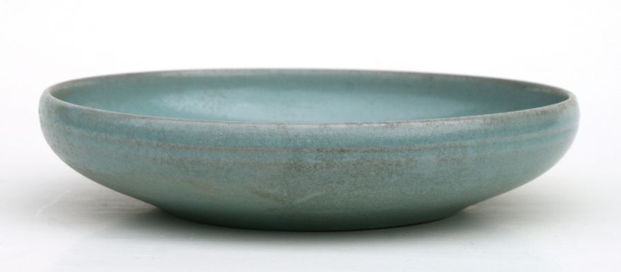 A Chinese celadon glazed shallow dish or brush washer, 19cms diameter.Condition ReportGood condition