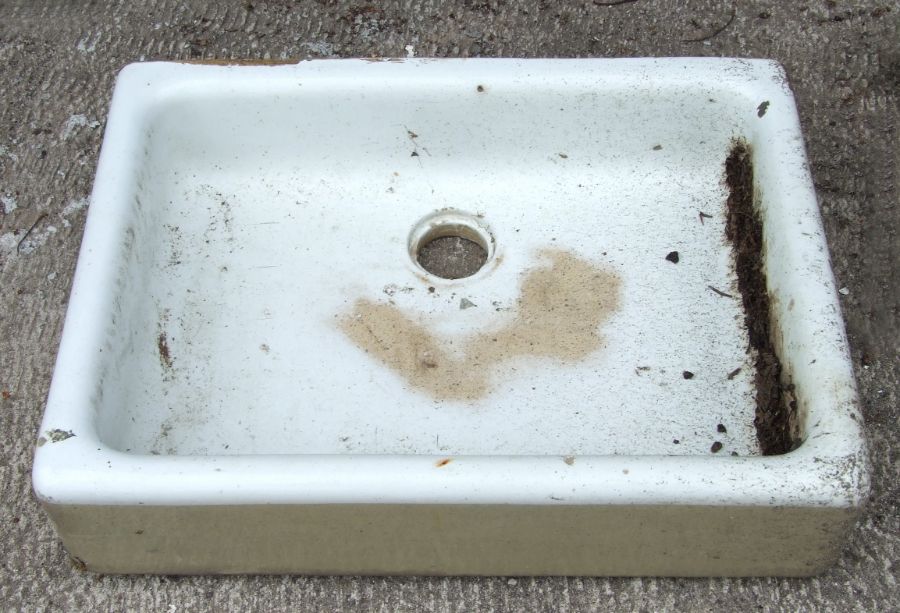 A ceramic butler's sink, 62cms wide.