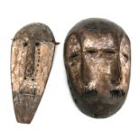 African Art / Tribal Art: A rare double Lega mask. 15cm high together with a smaller African mask