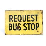 A vintage enamel sign 'Request Bus Stop', 43 by 27cms.