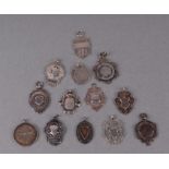 A group of silver fobs and medallions, various dates and makers marks, 81g (13).