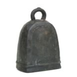 A Tibetan style bronze bell (lacks clapper), 18cms high.