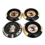 Three metal 'Friends of the Guinness' advertising ashtrays, 16cms diameter; together with a Toby