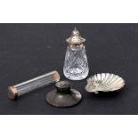 A silver Capstan inkwell; together with a silver mounted cut glass sugar caster; a silver scallop