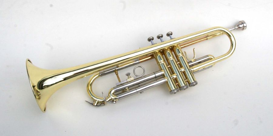 A brass and plated Conn trumpet, numbered 201BY, cased, with a Vincent Bach 1-1/4C mouthpiece.