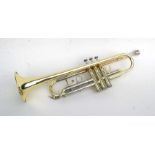 A brass and plated Conn trumpet, numbered 201BY, cased, with a Vincent Bach 1-1/4C mouthpiece.
