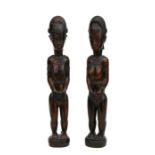 African / Tribal Art. A pair of African tribal carved wooden figures, 41cms high (2).