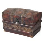 A faux leather and wooden bound dome top trunk, 60cm wide