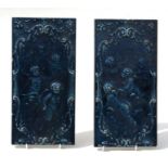 Two Victorian blue glazed tiles decorated with cherubs, each 15 by 30cms (2).
