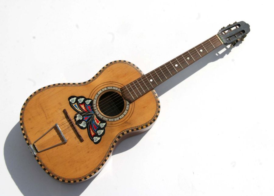 An early 20th century six-string Spanish acoustic guitar with makers label for Alfredo Albertini,