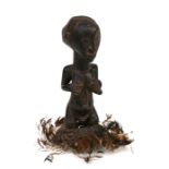 African Art / Tribal Art: A Luba / Hemba female figure with scarification. 19cm high: Provenance: