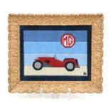 A wool work embroidery of an MG TD, framed & glazed, 24 by 19cms.