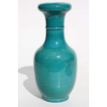 A Chinese deep green glaze vase, 20cm high