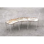 A distressed painted wrought iron three-seater corner garden bench, 172cms wide.