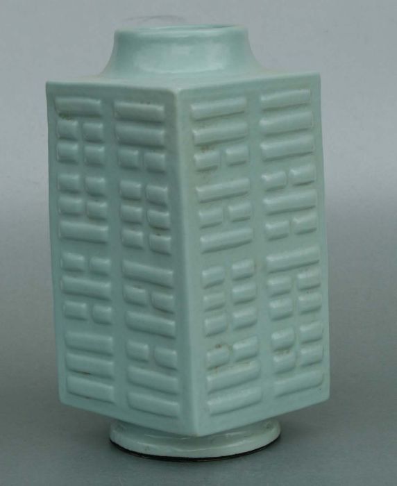 A Chinese celadon glaze Kong vase, six character blue mark to the underside, 28cms high.