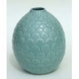 An Asian celadon glaze pine cone form vase, 24cms high.