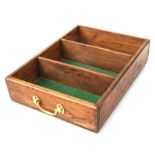 A pine three-division cutlery tray with brass carrying handles, 45cms wide.