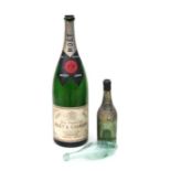 An empty 1966 Moet & Chandon Salmanazar champagne bottle, 57cm high; together with a 19th century