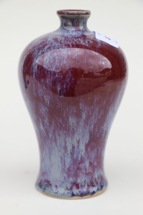 A Chinese Jun ware Meiping vase, 15cm high. Condition ReportSmall losses and chip to the glaze to - Image 5 of 8