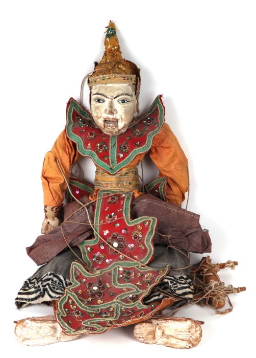 A large Burmese puppet with glass eyes and talking mouth, in traditional costume, approx 64cms
