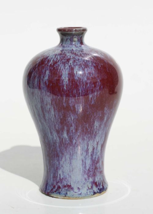A Chinese Jun ware Meiping vase, 15cm high. Condition ReportSmall losses and chip to the glaze to