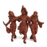 A 19th century continental cold painted spelter group depicting two Pierrot and a butcher, 15cms