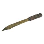 A Japanese Meiji period brass and copper letter knife with figural handle, 31cms long.