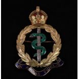 A high carat unmarked gold and enamel Army Medical Corps sweetheart brooch, cased.