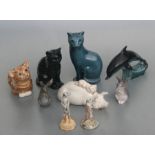 Two Royal Copenhagen figures of rabbits, 9cms high; together with two Beswick figures of Meerkats,