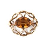 A 9ct gold citrine brooch, 8.3g.