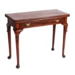 A George II mahogany tea table with single frieze drawer, on turned legs and pad feet, 92cms wide.