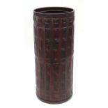 An Italian design Caleppio wood effect cylindrical stick stand, 51cms high.