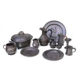 A copper kettle; together with a brass trivet; a pewter tray; other pewter plates and metal wares.