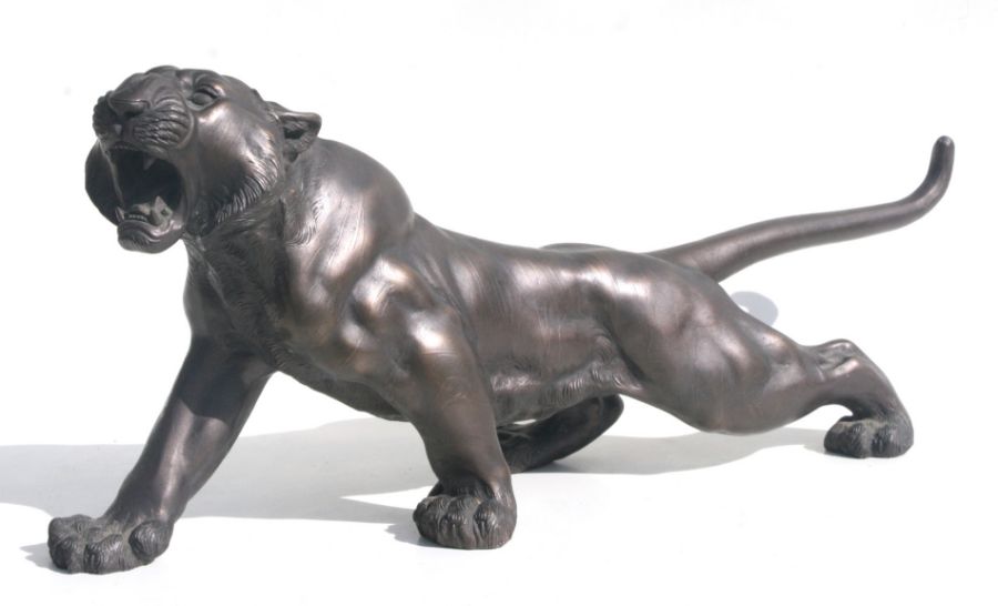 A large bronzed resin study of a snarling tiger, 63cms long. - Image 2 of 3