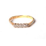 An 18ct gold five-stone diamond ring, approx UK size 'Q', 2g.