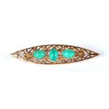 A 9ct pierced gold bar brooch of navette form set with three oval turquoise cabochons, 5.2cms