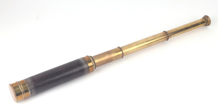 A late Victorian three-draw brass telescope, 74cms long extended, 25.4cms closed.