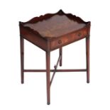 A 19th century style mahogany side table, the shaped galleried top above a single frieze drawer,