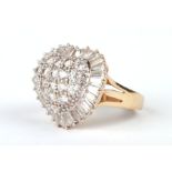 A 9ct gold heart shaped dress ring set with white stones, approx UK size 'N', 6.7g.