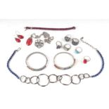 A quantity of silver jewellery to include gem set bracelets and rings.