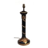 A Regency style black lacquer and gilt table lamp with rope twist and acanthus leaf decoration,