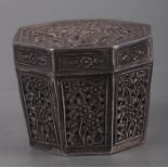 A Chinese white metal (tests as silver) pierced octagonal tapering box decorated with a phoenix