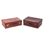 A goldsmiths & silversmith crocodile skin suitcase, 50cm wide together with a leather suitcase, 60cm
